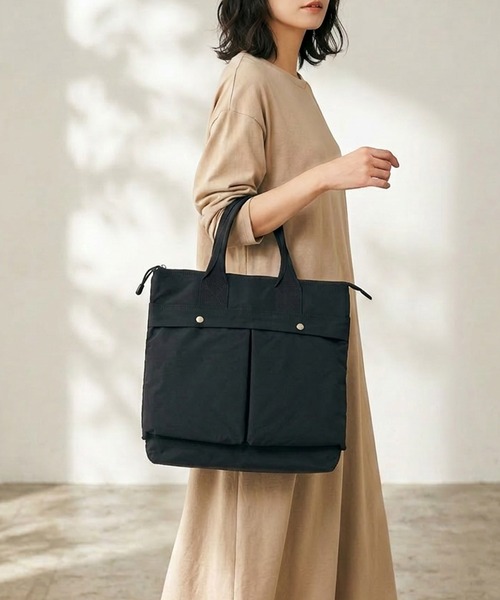 ADPOSION(アドポーション)の「《UNISEX》KONBU Nylon HELMET BAG / コンブナイロン ヘルメットバッグ(ショルダーバッグ・レディース・グレー/ブラック/ネイビー・FREE)」の1枚目の写真