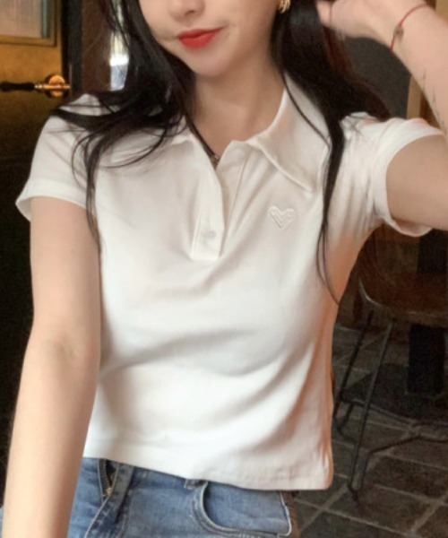 Emilie(エミリー)の「ワンポイントハートクロップド丈ポロシャツ(Tシャツ/カットソー・レディース・ピンク/ホワイト・FREE)」の1枚目の写真