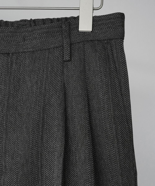 WYM LIDNM(ウィム バイ リドム)の「MELANGE TWEED CURVED SEAM SLACKS【SET-UP】(スラックス・メンズ・ブラック系/チャコール/ブラウン系・S/XS/M/L)」の4枚目の写真