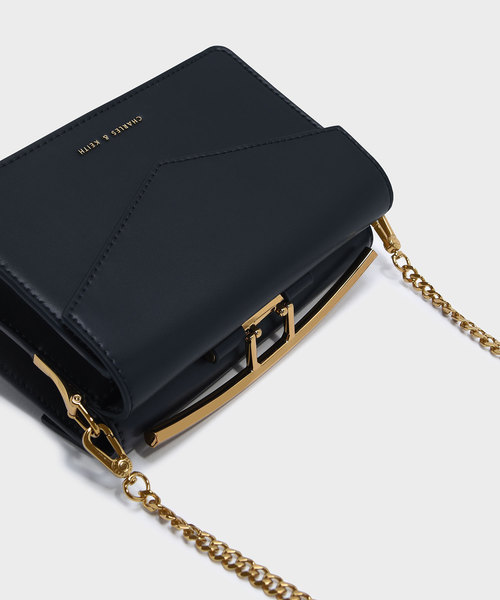 CHARLES & KEITH（チャールズ & キース）の「サーキュラーディテールクロスボディバッグ / CIRCULAR DETAIL