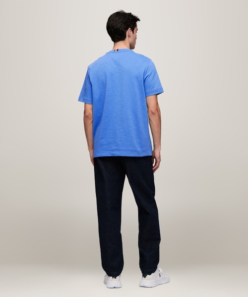 TOMMY HILFIGER(トミーヒルフィガー)の「モノグラムバッヂTシャツ(Tシャツ/カットソー・メンズ・ブルー/アイボリー/ブルー系その他・X-LARGE/SMALL/MEDIUM/LARGE)」の4枚目の写真