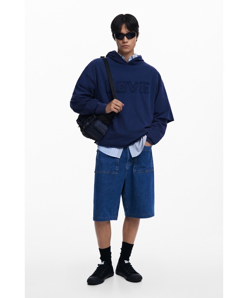 Desigual（デシグアル）の「【ユニセックス】レイヤードスリーブ パーカー（スウェット・メンズ・ブラック/ブルー・S/M/L/XL）」の6枚目の写真