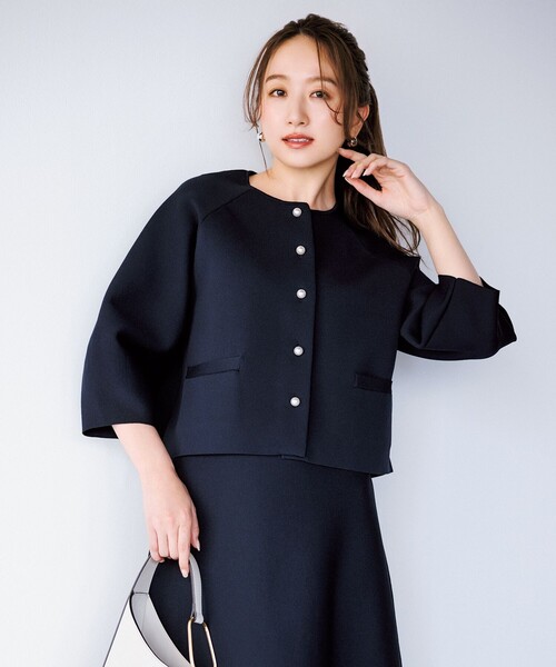 UNFILO(アンフィーロ)の「BEAUTY FORM KNIT パールボタン カーディガン(カーディガン/ボレロ・レディース・ネイビー系/ベージュ系/ブラック系・SMALL/MEDIUM/LARGE)」の3枚目の写真
