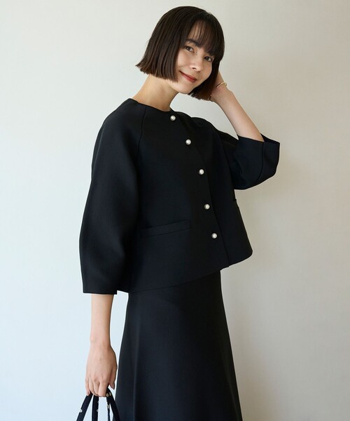 UNFILO(アンフィーロ)の「BEAUTY FORM KNIT パールボタン カーディガン(カーディガン/ボレロ・レディース・ネイビー系/ベージュ系/ブラック系・SMALL/MEDIUM/LARGE)」の20枚目の写真