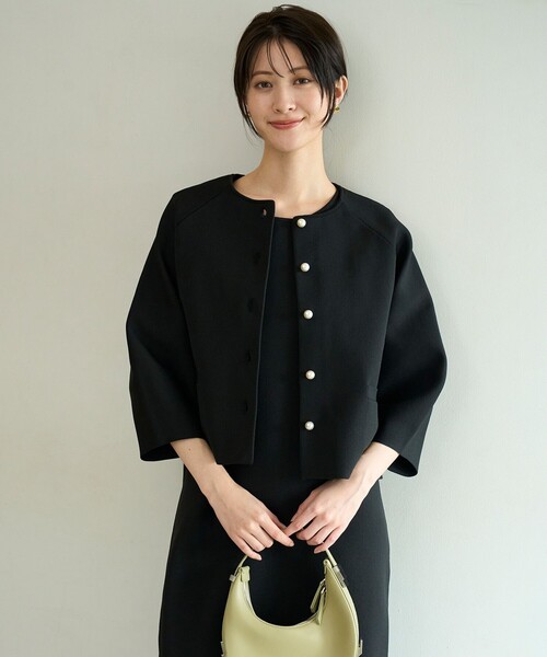UNFILO(アンフィーロ)の「BEAUTY FORM KNIT パールボタン カーディガン(カーディガン/ボレロ・レディース・ネイビー系/ベージュ系/ブラック系・SMALL/MEDIUM/LARGE)」の16枚目の写真