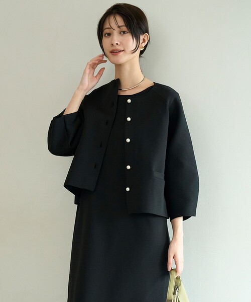 UNFILO(アンフィーロ)の「BEAUTY FORM KNIT パールボタン カーディガン(カーディガン/ボレロ・レディース・ネイビー系/ベージュ系/ブラック系・SMALL/MEDIUM/LARGE)」の15枚目の写真