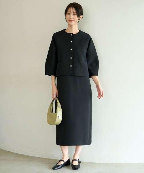 UNFILO(アンフィーロ)の「BEAUTY FORM KNIT パールボタン カーディガン(カーディガン/ボレロ・レディース・ネイビー系/ベージュ系/ブラック系・SMALL/MEDIUM/LARGE)」の14枚目の写真