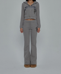 GILAARCHIVE（ギラアーカイブ）の「CROSS PATCHED PISTOL SWEATPANTS_BEIGE（スウェットパンツ）」