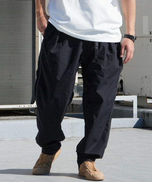 and wander(アンドワンダー)の「and wander/アンドワンダー×Gramicci/グラミチ C/N climbing pant コラボレーションロゴ クライミングパンツ 2026年春夏(その他パンツ・メンズ・カーキ/ブラック・L/XL/M)」の5枚目の写真