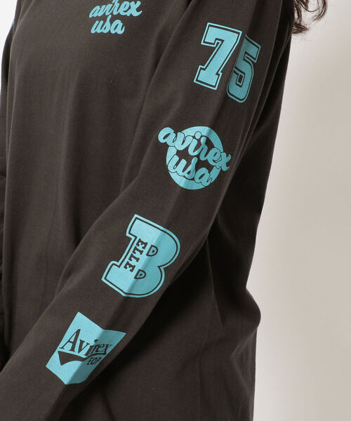 AVIREX（アヴィレックス）の「【直営店限定】SLEEVE LOGO L/S T-SHIRT/ スリーブロゴ ロングスリーブティーシャツ（Tシャツ/カットソー・レディース・チャコール/ホワイト・FREE）」の6枚目の写真