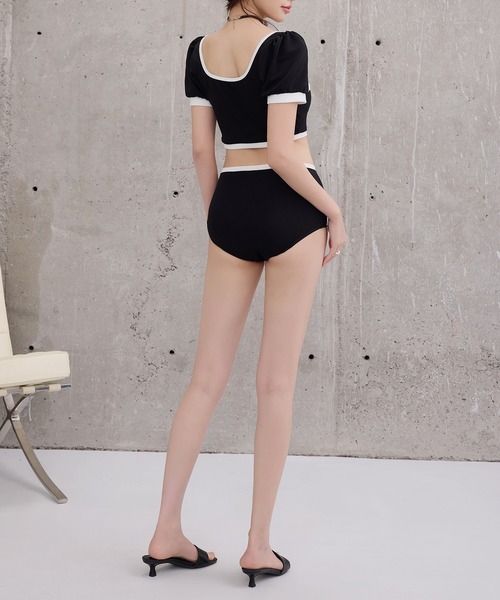 TeddyShop(テディショップ)の「レディース水着 半袖クロップドパール調ボタン配色ビスチェビキニ+タックスカート 3点セット(水着・レディース・ブラック・L/M/S)」の2枚目の写真