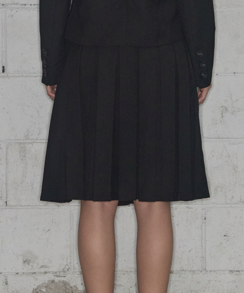 FANCY CLUB（ファンシークラブ）の「クラシックバックルプリーツミディスカート (ブラック) F25ZD970（スカート・レディース・その他・ONE）」の2枚目の写真
