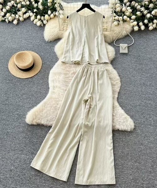 AMAJI(アマジ)の「フリルデザインセットアップ(ノースリーブトップス×ワイドパンツ)(セットアップ・レディース・ホワイト/ライトブルー/ベージュ/ネイビー・FREE)」の9枚目の写真