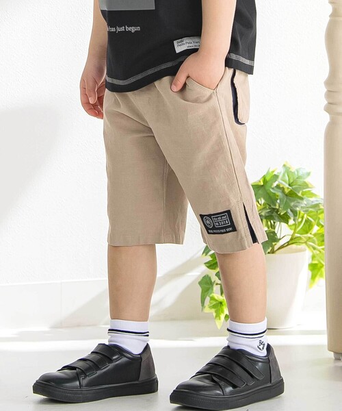 BeBe Petits Pois Vert(ベベプチポワヴェール)の「マチ配色ショートパンツ(その他パンツ・キッズ・ブラック/ベージュ・120cm/130cm/150cm/140cm/110cm/160cm)」の1枚目の写真