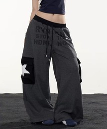 T.FOX （ティーフォックス）の「26aw 【ユニセックス】スターロゴプリント配色ポケットボーダーワイドスウェットパンツ（スウェットパンツ）」