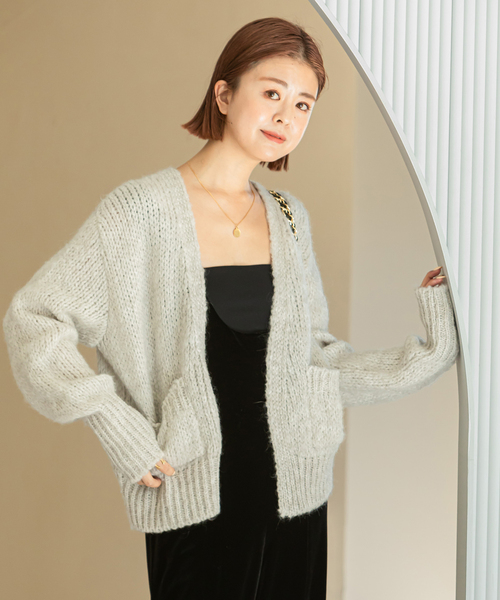 U by SPICK&SPAN（ユーバイスピックアンドスパン）の「【TRICOT JEAN MARC】 ポケット付ショートニットカーディガン（カーディガン/ボレロ・レディース・アイボリー/オレンジ・FREE）」の2枚目の写真