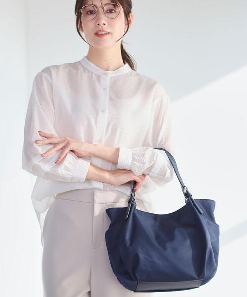 Reflect（リフレクト）の「【3WAY／しっかり収納／インナーバッグ入り／ショルダー付き】ナイロンバッグ（ショルダーバッグ・レディース・ネイビー/ブラウン系その他/サックスブルー・00）」の2枚目の写真