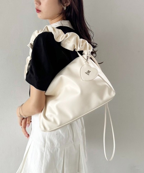 one after another NICE CLAUP(ワンアフターアナザーナイスクラップ)の「ハートミラーチャーム付きドロストバッグ(トートバッグ・レディース・アイボリー/シルバー/ブラック・FREE)」の1枚目の写真