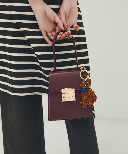 La TOTALITE(ラトータリテ)の「MILOS/ミロス ビット付きミニバッグ(ショルダーバッグ・レディース・ボルドー/ブラック・FREE)」の1枚目の写真