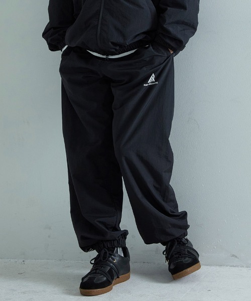 EGO TRIPPING(エゴトリッピング)の「mp15256-DAYGLYDE TRACK PANTS トラックパンツ(626755)(その他パンツ・メンズ・ブラック/ダークブラウン・M/L)」の4枚目の写真