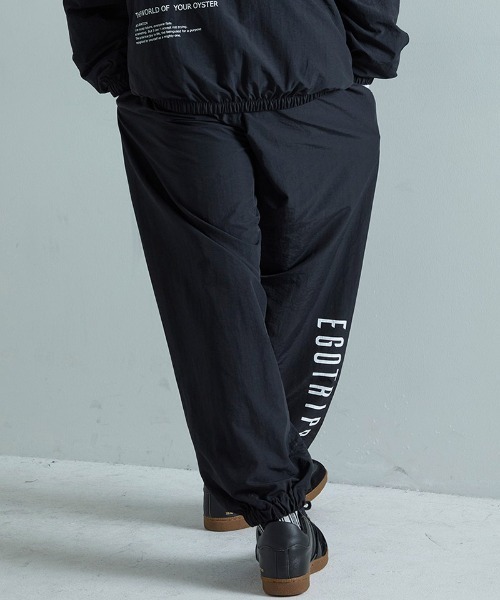 EGO TRIPPING(エゴトリッピング)の「mp15256-DAYGLYDE TRACK PANTS トラックパンツ(626755)(その他パンツ・メンズ・ブラック/ダークブラウン・M/L)」の5枚目の写真