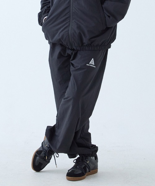 EGO TRIPPING(エゴトリッピング)の「mp15256-DAYGLYDE TRACK PANTS トラックパンツ(626755)(その他パンツ・メンズ・ブラック/ダークブラウン・M/L)」の6枚目の写真