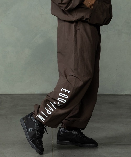 EGO TRIPPING(エゴトリッピング)の「mp15256-DAYGLYDE TRACK PANTS トラックパンツ(626755)(その他パンツ・メンズ・ブラック/ダークブラウン・M/L)」の19枚目の写真