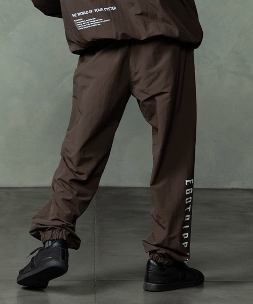 EGO TRIPPING(エゴトリッピング)の「mp15256-DAYGLYDE TRACK PANTS トラックパンツ(626755)(その他パンツ・メンズ・ブラック/ダークブラウン・M/L)」の20枚目の写真