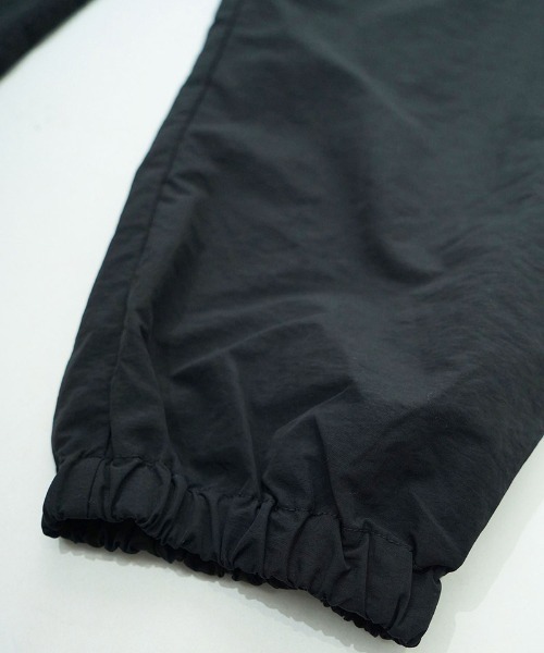 EGO TRIPPING(エゴトリッピング)の「mp15256-DAYGLYDE TRACK PANTS トラックパンツ(626755)(その他パンツ・メンズ・ブラック/ダークブラウン・M/L)」の14枚目の写真