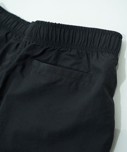 EGO TRIPPING(エゴトリッピング)の「mp15256-DAYGLYDE TRACK PANTS トラックパンツ(626755)(その他パンツ・メンズ・ブラック/ダークブラウン・M/L)」の7枚目の写真