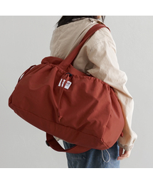 D.LAB（ディラップ）の「ストリングポケットボストントラベルバッグ - ブリックレッド（ボストンバッグ）」