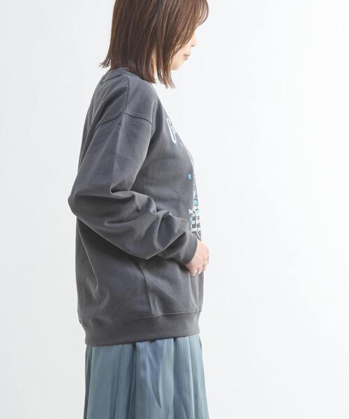 CONVERSE TOKYO(コンバーストウキョウ)の「LILY FLOWER PRINT SWEAT(スウェット・レディース・イエロー/スミクロ/アイボリー・MEDIUM/SMALL)」の9枚目の写真