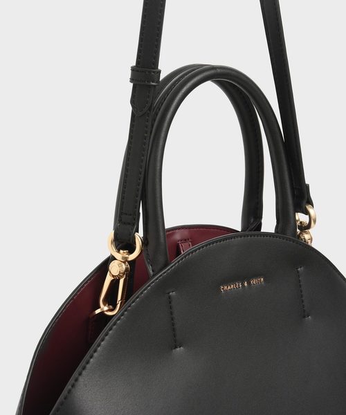 CHARLES & KEITH（チャールズ & キース）の「スネークプリント トップハンドルラージドームバッグ / Snake Print