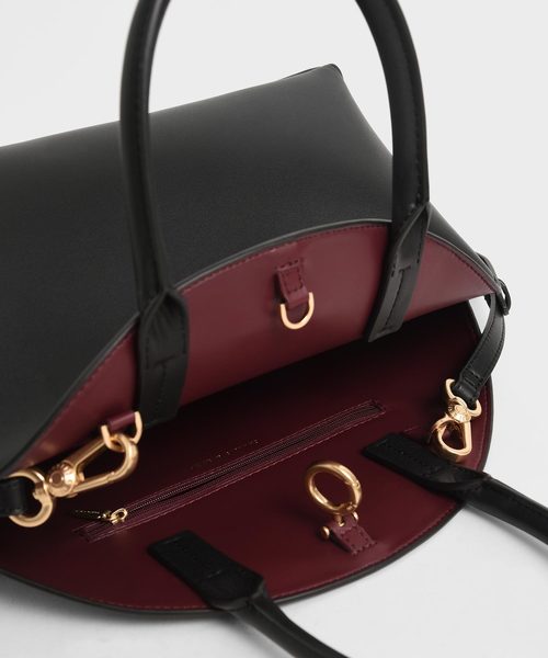 CHARLES & KEITH（チャールズ & キース）の「スネークプリント トップハンドルラージドームバッグ / Snake Print