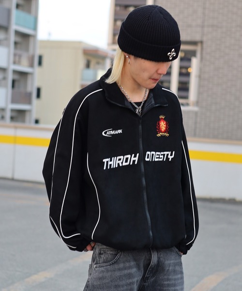 ATMARK(アットマーク)の「《2サイズ展開 / UNISEX 》ATMARK エンブレムロゴスウェードトラックジャケット(ブルゾン・レディース・カーキ/ピンク/ブラック・L/M)」の6枚目の写真