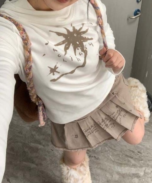 SHERU(シェル)の「タートルネックトップス ネル起毛(Tシャツ/カットソー・レディース・ブラック/ホワイト・M)」の3枚目の写真