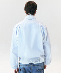 WINDER（ワインダー）の「CONCEAL-ZIP SHEER JACKET - OFF WHITE（ナイロンジャケット）」