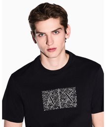 ARMANI EXCHANGE（アルマーニエクスチェンジ）の「【A|X アルマーニ エクスチェンジ】ダイアゴナルオールオーバーロゴ ボックスプリント 半袖クルーネックTシャツ SLIM（Tシャツ/カットソー）」