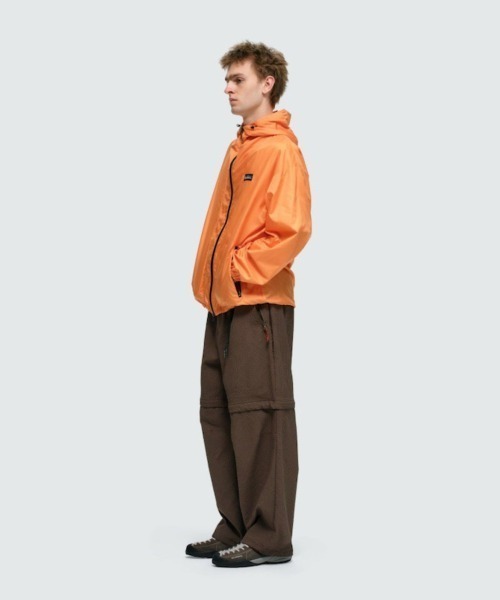WILD THINGS(ワイルドシングス)の「WILD THINGS PACKABLE WIND PARKA(ワイルドシングス パッカブル ウィンドパーカー)(ナイロンジャケット・メンズ・ブラック/オリーブ/オレンジ・MEDIUM/LARGE/X-LARGE)」の7枚目の写真