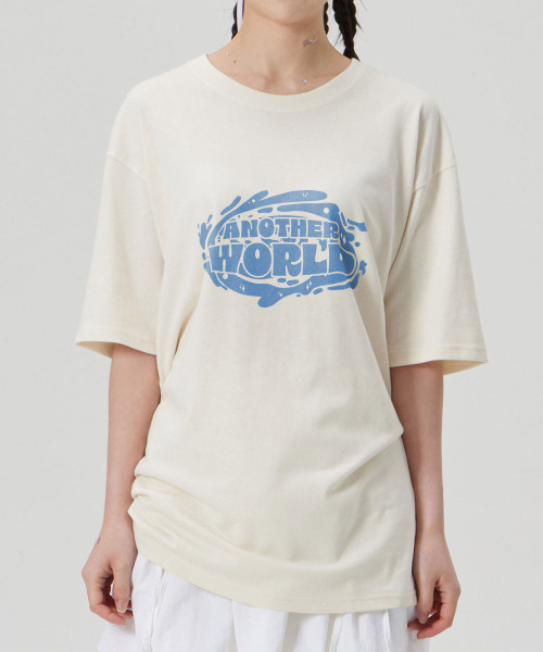 ASTRAL PROJECTION（アストラルプロジェクション）の「[アナザーワールド]コットンルーズフィット半袖Tシャツ_バターミルク（Tシャツ/カットソー・メンズ・その他・MEDIUM/LARGE/X-LARGE/XX-LARGE）」の3枚目の写真