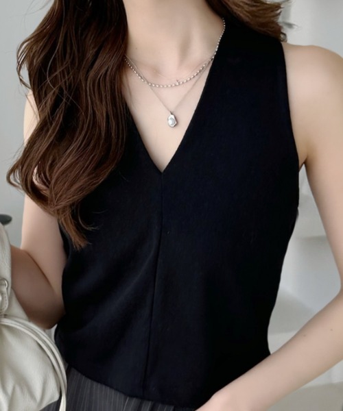 Ada.（エイダ）の「Vネック ベストレイヤード ドッキング 半袖 トップス（Tシャツ/カットソー・レディース・アイボリー/ブラック/チャコール・FREE）」の4枚目の写真