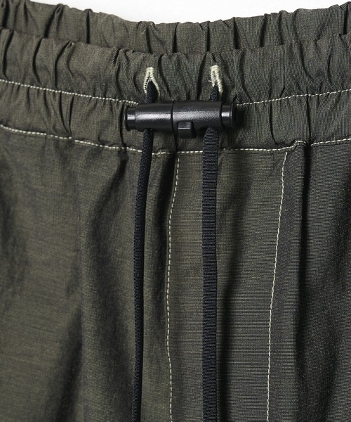 POLIQUANT(ポリクアント)の「【POLIQUANT/ポリクアント】THE BREATHABLE GRADIENT GARMENT DYEING S/L PANTS(その他パンツ・メンズ・ライム/ブラック・1/2)」の11枚目の写真