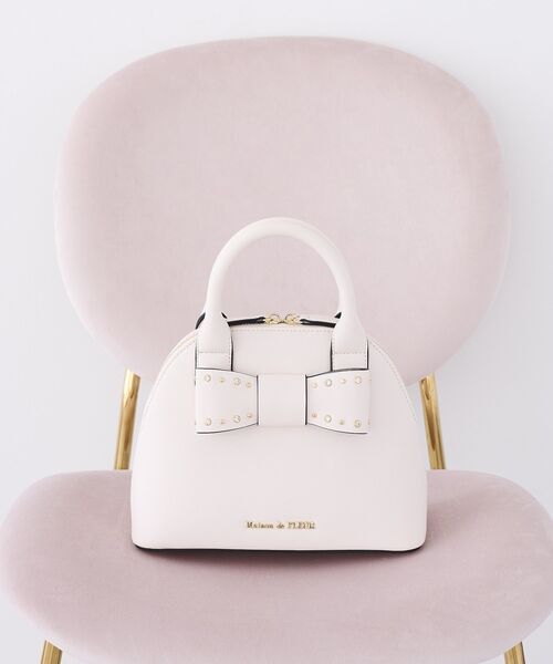 Maison de FLEUR(メゾンドフルール)の「リボンハーフムーン2Wayバッグ(ハンドバッグ・レディース・ライトピンク/ブラック・FREE)」の1枚目の写真