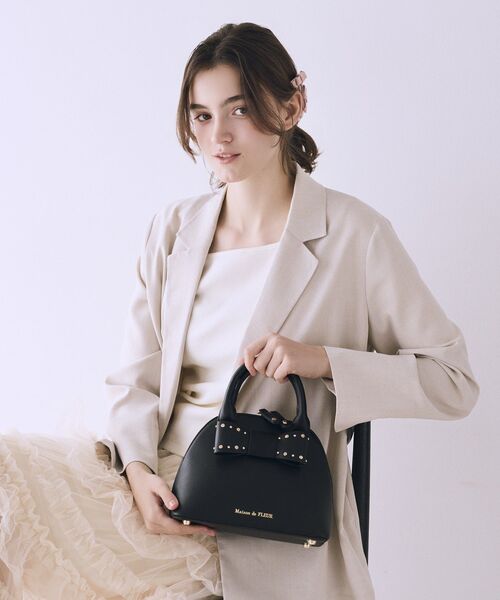 Maison de FLEUR(メゾンドフルール)の「リボンハーフムーン2Wayバッグ(ハンドバッグ・レディース・ライトピンク/ブラック・FREE)」の2枚目の写真