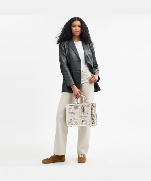 COACH X PEANUTS】ローグ バッグ・ニュースペーパー プリント