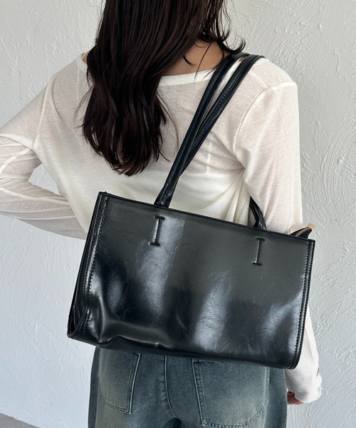 apres jour mignon(アプレジュールミニョン)の「【apresjour mignon×ARIAZ】フェイクレザースクエアバッグ(ハンドバッグ・レディース・ブラック/オフホワイト・ONESIZE)」の1枚目の写真