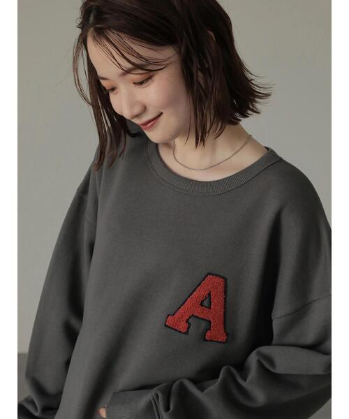 AMERICAN HOLIC(アメリカンホリック)の「ワッペンロゴ裏毛カットプルオーバー(スウェット・レディース・ネイビー/チャコールグレー・L/M)」の1枚目の写真