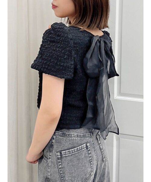 dazzlin(ダズリン)の「バックリボンシャーリングカットプルオーバー(Tシャツ/カットソー・レディース・パープル/オフホワイト/ブラック・FREE)」の3枚目の写真