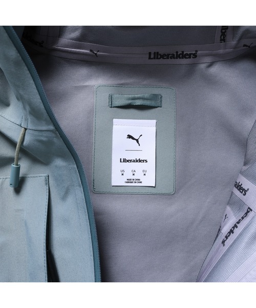 PUMA（プーマ）の「PUMA PUMA x Liberaiders LIGHT JACKET（プーマ  x リベレイダース ライトジャケット）（ナイロンジャケット・メンズ・グリーン系・MEDIUM/LARGE/X-LARGE）」の7枚目の写真