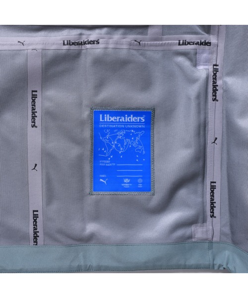 PUMA（プーマ）の「PUMA PUMA x Liberaiders LIGHT JACKET（プーマ  x リベレイダース ライトジャケット）（ナイロンジャケット・メンズ・グリーン系・MEDIUM/LARGE/X-LARGE）」の9枚目の写真